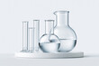 © Achirawee - A sterile lab table with test tubes and beakers set up for an experiment, with a clear background and room for text.