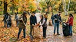 © Sianna - Community Volunteers Cleaning Up Leaves In Colorful Park