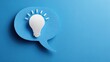 © SilentSmog - Conceptual blue paper speech bubble with white lightbulb icon on blue background innovation creativity thinking communication business strategy solution inspiration marketing