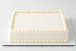 © grafray25 - Blank white rectangular sheet cake mockup with piped buttercream border. Empty frosted celebration template with copy space for custom birthday message and bakery branding.
