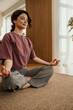 © La Famiglia - Woman meditating in zen yoga pose for mindfulness