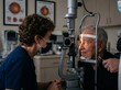 © mdnazirhossain - Professional eye doctor examining a senior patient using a slit lamp microscope in a clinic office for a routine vision health checkup