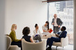 © BusinessClass by W61 - Business team discusses strategy during a meeting in a London office