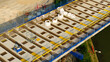 © AmazingAerialAgency - Aerial view of the HS2 railway construction site showing concrete bridge segments, steel reinforcement bars, and construction materials in Long Itchington, England, United Kingdom.