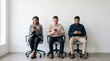 © StockVisionLab - Three diverse people sitting in office chairs looking at smartphones, waiting room scenario, digital distraction, modern communication habits, business casual attire in minimalist