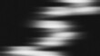 © Arthapicture - Abstract cinematic monochrome background texture with grainy motion blur light leaks.