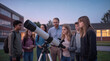 © ChaoticDesignStudio - Science teacher explaining astronomy to diverse group of high school students during stargazing session. Educational workshop with telescope in school courtyard at twilight.