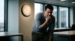 © Midnight - Stressed employee biting fingernails in a modern office environment
