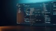 © mcjanuald - Advanced software development environment showing complex code script on transparent glass display with blurred programming interface in dark office background