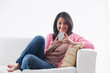 © IndiaPix - Young woman using her cell phone