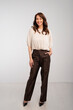 © sepy - Full length of an attractive woman cheerful smiling against isolated white background