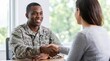 © Farman Studio - Smiling African American Soldier Shaking Hands With Woman Across Desk In Office