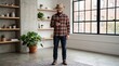 © Тоха Шикула - Man in casual attire using smartphone in modern indoor space