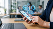 © Mirivox - Close-up of hands using a smartphone with chat bubbles and headset icon, representing communication and business services in an office setting, symbolizing connectivity and support