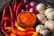 © Hanif - Sambal and sambal ingredient like chilli and onion closeup image