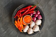 © Hanif - Sambal and sambal ingredient in the stone mortar