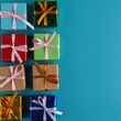 © Phetsala - A variety of small, colorful packet gifts carefully wrapped and secured with ribbon, ready to be distributed for celebrations and holidays ,surprise ,holiday ,party