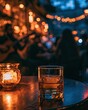 © Paris - Cozy bar scene with a drink and candle, warm lights, blurred people