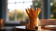 © pisan thailand - Low angle from desk level of a bunch of sharpened pencils in soft cinematic light