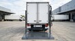 © Tsalsa - Delivery truck with lowered hydraulic tail lift at loading dock.