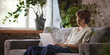 © master1305 - Teenage boy using laptop with digital book interface at home. Concept of online libraries, reading platforms, digital textbooks, homework support and distance education services.