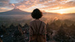 © BlackBridge Media - Woman Watching Sunrise over Borobudur Temple in Indonesia