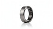 © Amber - Close-up of metallic smart ring with white finish on reflective surface
