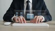 © Mst Rozina Pervin - Document management system interface displayed on a holographic screen as a person types on a keyboard. The focus is on efficiency and organization in a professional setting