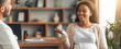 © Prostock-studio - Happy Smiling Pregnant Black Woman Engaging In Conversation With Male Doctor At Healthcare Clinic, Discussing Health And Wellness In A Professional Office Setting. Healthcare Concept.