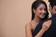© IndiaPix - Portrait of beautiful young woman smiling with man