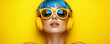 © Natalia Klenova - Young woman with blue hair and yellow headphones against yellow