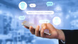 © InfiniteFlow - A hand holding a smartphone shows chat bubbles with a virtual assistant, representing modern communication and digital customer support in an engaging environment. Gantry