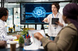 © DC Studio - Manager presents an artificial intelligence plan to increase business productivity, discussing a software development roadmap and technology strategy with colleagues in a startup office.