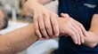 © Thipsuda - Physical therapist gently assists patient with shoulder and arm rehabilitation, focusing on mobility and recovery in clinical setting, promoting healing and support