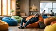 © Kevin - Student sleeping on a beanbag chair with a book covering his face in a library