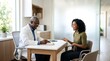 © Bernah - Smiling Doctor Consulting With Female Patient In Modern Medical Office