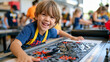 © Maksym Tereshchenko - A young child in a crowded multilingual community center reaches upward toward illustrated language flashcards arranged in a funnel shape on a low board, a tutoring session in progress with word con
