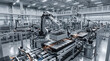 © Maham - Robotic arms working on an automated battery production line inside a modern bright factory facility with metal components and equipment