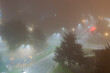 © massimo_g - Scena notturna con strada curva, alberi, parco giochi e luci diffuse dalla nebbia. Ideale per temi città, atmosfera, notte, introspezione, paesaggio urbano e fotografia ambientale.