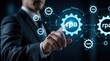 © Maryna - Businessman interacts with RPA gear interface. Digital automation system links multiple processes for workflow efficiency. Future tech streamlines corporate operations.