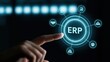 © Generative AI - A human finger touches a glowing holographic interface displaying the letters ERP surrounded by various business icons against a dark background.