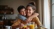 © Nuttamon - A joyful son hugs his mother during a family breakfast in a � Family Lifestyle and Happy Home Concept for Authentic Living