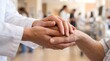 © Shraddha - A caring medical professional holds hands with a patient inside a hospital ward to offer comfort and support.