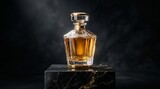 Elegant glass perfume bottle with golden liquid on dark background