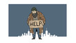 © Priya - Sad bearded homeless man wearing ragged clothes and a beanie holding a help cardboard sign in a city environment.