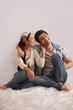 © IndiaPix - Full length of young couple having fun together at home