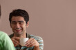 © IndiaPix - Happy young man on coffee date with woman