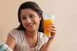 © IndiaPix - Beautiful young woman having orange juice with man