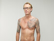 © Westend61 - Mature man looking away with tatoos