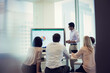© Westend61 - Business people listening to presentation